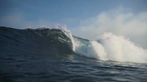Wave breaking and passing by underwater view Stock Footage 261705963