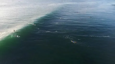 A wave breaking beautifully in the setting sun in Bali, Indonesia Stock Footage 61948111