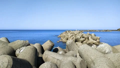 Wave-breaking blocks line the coast, Tohoku  Japan Stock Footage 319412855