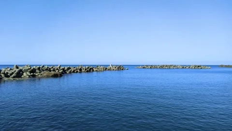 Wave-breaking blocks line the coast, Tohoku  Japan Video stock 319922447