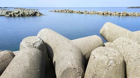 Wave breaking blocks on Shonai Coast, Yamagata prefecture Japan Stock-Footage 313413485