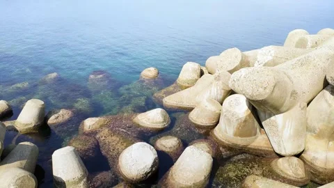 Wave breaking blocks on Shonai Coast, Yamagata prefecture Japan Stock Footage 313413498
