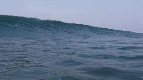 Wave breaking on camera / slow-motion from underwater / 4K 120p / High Quality Stock Footage 106853232