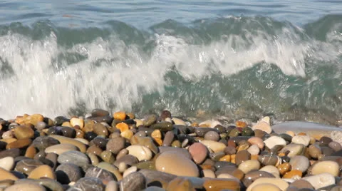 Wave breaking on the coast Stock Footage 26295628