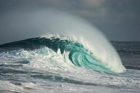 Wave breaking in ocean Stock Photos
