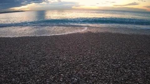Wave Breaking on Pebble Shore at Mediterranean Coast Видео 333189848