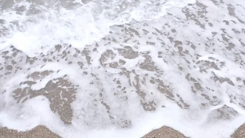 Wave breaking on the seashore Stock Footage 106924521