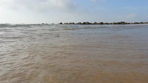 Wave breaking on shore in slow motion. Stock Footage 171657964