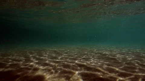 Wave breaking from under the water. Stockbeeldmateriaal 49649026