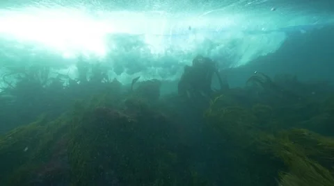 Wave breaking from under the water. Stockbeeldmateriaal 49787972