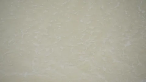 A wave breaking on a white sand beach Vidéo 146616080