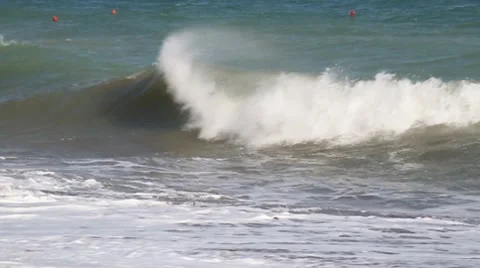 Wave breaks about coast Stock Footage 7747836