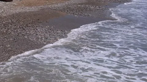 Wave breaks about coast Stock Footage 8968097