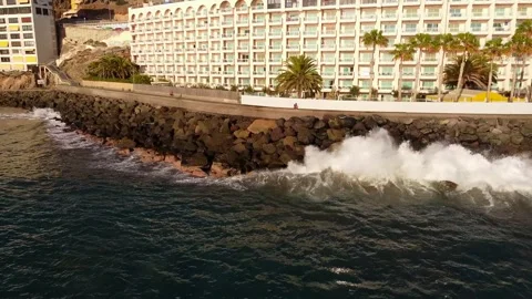 Wave breaks at coast 動画素材 153540401