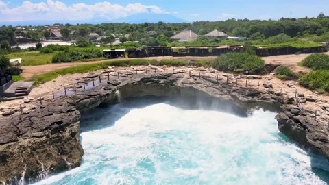 Wave breaks at Devil's Tear Nusa Lembongan Stock Footage 183164826
