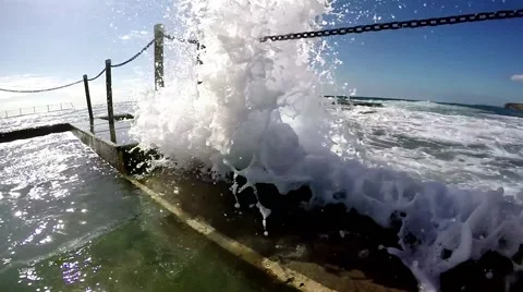 Wave breaks into ocean pool in slow motion Stock-Footage 58201707