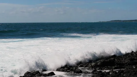 Wave breaks on the rocks at eastern shore of Jeju-do Island, South Korea Stock Footage 288571075