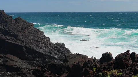 Wave breaks on the rocks at eastern shore of Jeju-do Island, South Korea Stock Footage 288571080