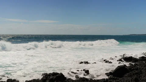 Wave breaks on the rocks at eastern shore of Jeju-do Island, South Korea Stock Footage 288571128