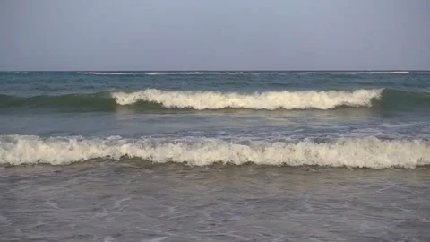 Wave breaks on sandy beach 16x slow motion 480 fps Stock-Footage 85973621