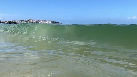 Wave at carbis bay cornwall Stock Footage 154304627