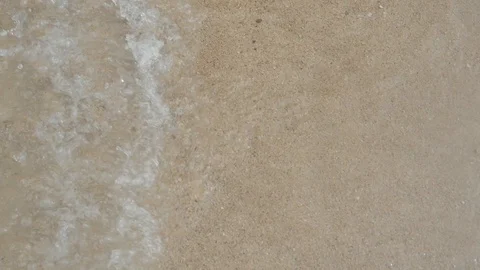 Wave on clear sand beach Stock Footage 106398892