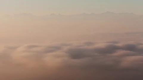 A wave of clouds at sunrise Stockbeeldmateriaal 83678216