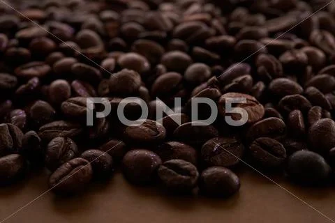 Wave of coffee beans Stock Photos