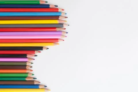 A wave of colored pencils Stock Photos