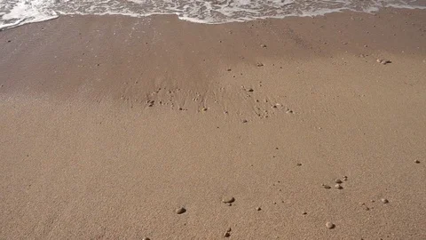 The wave coming to the beach in slow motion Stock Footage 111577700