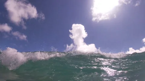 Wave Crashes on Camera, Side View of More Waves Stock Footage 260667421