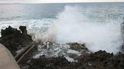 Wave  crashes over coral  a1275 Stock Footage 49832889