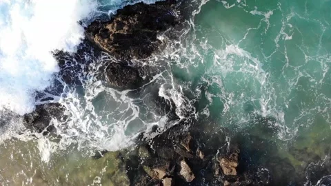 Wave crashes on Rocks from drone footage - Ballito South Africa Stock Footage 141389638