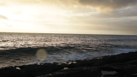 Wave Crashes At Sunset Stock Footage 104809043