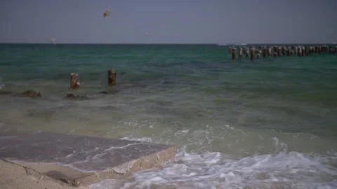 Wave Crashin On a Small Dock - Beach - Angled Stock-Footage 139532674