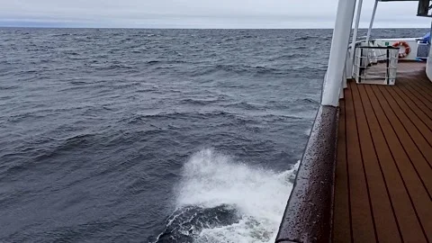 Wave crashing against a ship railing. Stock Footage 341789916