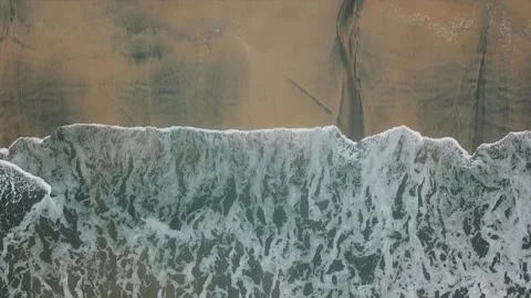 Wave crashing on the beach (Drone shot) Stock Footage