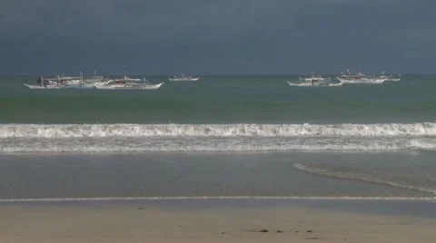 Wave crashing onto the beach Stock Footage 10573273