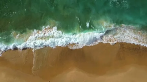 Wave Crashing Onto The Beach Stock Footage 311415959