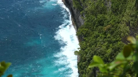 WAVE CRASHING AT BOTTOM OF CLIFF Stock Footage 221669059
