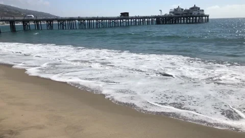 Wave Crashing Near Malibu Pier Stock Footage