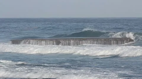 Wave crashing on reef Stock Footage 8981177
