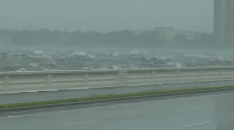 Wave Crashing on Road Stock Footage 25332226