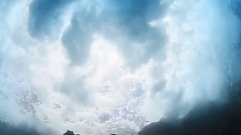 Wave crashing into water underwater ocean Stock Footage