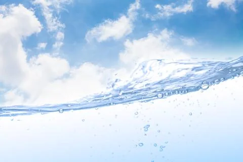 Wave of drinking water and bubble air white sky background. Stock Photos