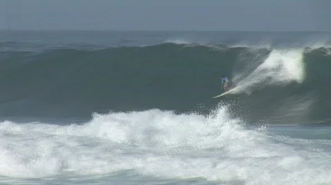 Wave eats man Motion JPEG Stock Footage 800475