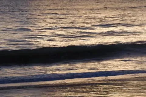 Wave in evening Stock Footage 10734731