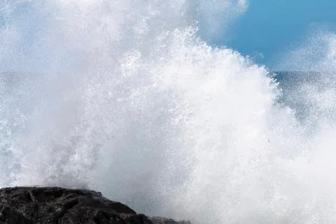 Wave exploding towards the camera at the northern coast of jandia in fuerteve Stock Photos