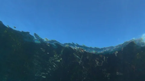 Wave exploding underwater 動画素材 127631172