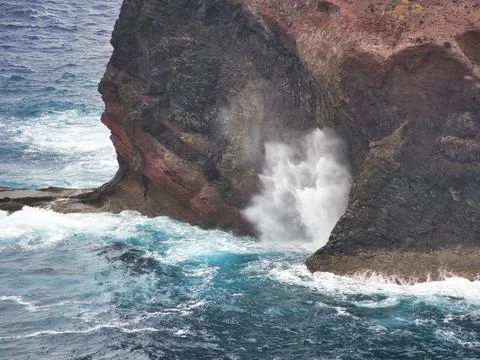 Wave Explosion in Volcanic Sea Cave - Dynamic close-up of a powerful ocean .. Stock Photos